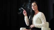 Watch lovely Tanya lighting up and smoking a 120mm Cigaronne