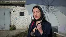 Attractive Lera taking a smoke break outside