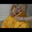 03:40 Min. video with Julia tied and gagged in a yellow downjacket and rainpants in a bathtube