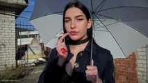 Attractive Lera taking a smoke break outside