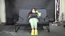 Marie bound and gagged in a shiny nylon Downjacket