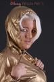 Blonde archive girl posing in a studio wearing a sexy golden rainwear combination (Pics)