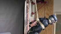 Rachel Adams bound and pantygagged in shiny nylon Rainwear