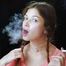 Watch the beauty with crystal blue eyes smoking a 120mm cigarette in her fresh video