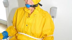 Katharina tied, gagged and hooded on a chair wearing sexy yellow rainwear (Pics)