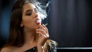 Dreamy lady Irina showing her smoking skills in a closeup video