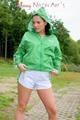 Enni having a good time outdoor wearing sexy shiny nylon shorts and a top posing for the camera (Pics)