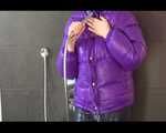 Get an Archive Video with Mara enjoying a shower with her shiny nylon downjacket