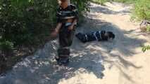 Dana and La Pulya - Bag racing completely packed in trash bags with duct tape (video)