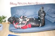 Jill tied and gagged wearing shiny nylon oldschool downwear (Pics)