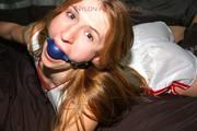 Katharina tied and gagged in shiny nylon shorts