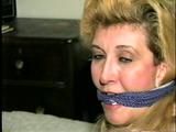 44 Yr OLD HOUSEKEEPER SUCKS & SMELLS HER OWN TOES, LICKS HER WRISTS, STUFFS & HANDGAGS HER OWN MOUTH & IS TIGHTLY BOUND & CLEAVE GAGGED ON BED (D50-2)