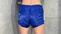 Myxxxy wetting her shiny nylon Shorts