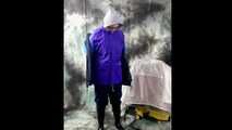 Nadja posing in layers of raingear part 2