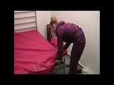 Get 2 Videos of a nice woman from our 2008 Archive enjoying her shiny nylon Rainwear at home