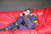 *** HOT HOT HOT*** NEW MODELL*** DESTINY wearing a sexy blue/red shiny nylon rain suit and a life jacket ties and gagges herself with cuffs on a sofa (Pics)