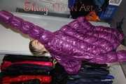 Watching SEXY SONJA wearing a sexy black shiny downskirt and a purple shiny nylon downjacket lolling on the bed (Pics)