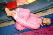 Katharina tied and gagged in shiny nylon ski suit