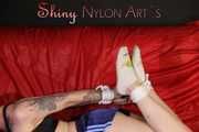 ***COURTNEY***NEW MODELL***being tied and gagged with ropes and a clothgag on a sofa wearing an oldschool blue shorts and a black top trying to get out (Pics)