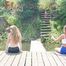 Stella and Leonie posing on a lake wearing sexy shiny nylon shorts and tops (Pics)