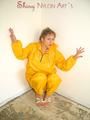 Leonie wearing a super sexy yellow rainwear combination posing outdoor (Pics)