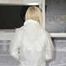 Miss Francine in K-Way und transparenten Regensachen