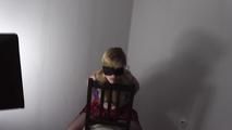 Clara in handcuffs