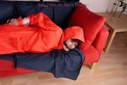 Julia tied and gagged by Alina in heavy raingear