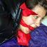 Alina tied and gagged in shiny down clothes