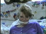 22 Yr OLD LISA IS RUBBER BAND BALL-GAGGED, MOUTH STUFFED, HANDGAGGED, OTM & CLEAVE GAGGED (D43-6)