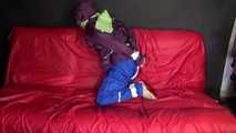 SANDRA being tied and gagged on a sofa with ropes and a clothgag wearing a sexy blue shiny nylon rain pants and a purple rain jacket  (Video)