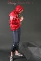 Anastasia posing in a foto studio wearing supersexy rainwear (Pics)