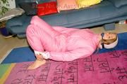Katharina tied and gagged in shiny nylon ski suit