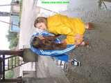 Get 971 pictures of Stella and Leoni wearing shiny nylon rainwear made 2005-2008 in one huge package!