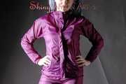 Mara posing infront of the camera for you wearing supersexy purple rainwear and rain boots (Pics)