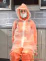 Miss Francine in AGU raingear and transparent raingear (original AGU) bound and gagged on a chair