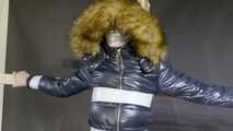 Lana tied and gagged in a shiny nylon Downjacket