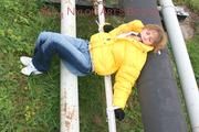 Leonie tied and gagged outdoor wearing a shiny yellow downjacket (Pics)