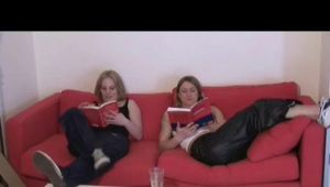 Katharina and an archive girl wearing different rainwear and downwear during the day (Video)