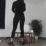Mistress Cleo squirts cologne into the mouth of the slave lying in the toilet.
