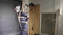 Myxxxy bound and gagged in a shiny nylon Rainsuit