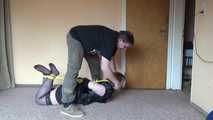 Hogtied in yellow ropes