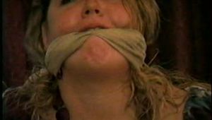 BBW MICHELLE IS WRAP VET TAPE GAGGED, CLEAVE GAGGED, BAREFOOT, TOE-TIED & BOUND UP ON THE BED (D47-13)