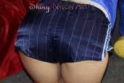 Watching sexy Sonja wearing a supersexy oldschool blue shiny nylon shorts and a lightblue rain jacket during her workout with barbells (Pics)