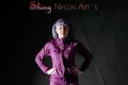 Mara posing infront of the camera for you wearing supersexy purple rainwear and rain boots (Pics)
