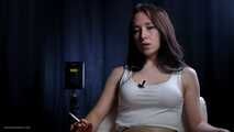 Brunette teen is smoking cork 100mm cigarette