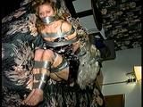 43 YEAR OLD WAITRESS IS TAPE HOG-TIED, BAREFOOT, TOE-TIED & WRAP TAPE GAGGED (D65-8)