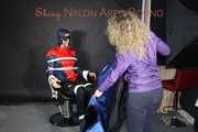 Watching Pia wearing a supersexy shiny nylon rainwear sitting on a hairdresser´s chair being tied and gagged with ropes, eye patches and a ballgag  (Pics)