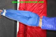 Sexy Sonja being tied and gagged overhead wearing a sexy shiny nylon rainwear combination (Pics)