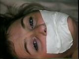 31 Yr OLD SEXY SUSIE IS TIED UP IN HER BASEMENT, TAPE GAGGED, CROTCH ROPED & LEGS TIED UP IN THE AIR (D52-16)